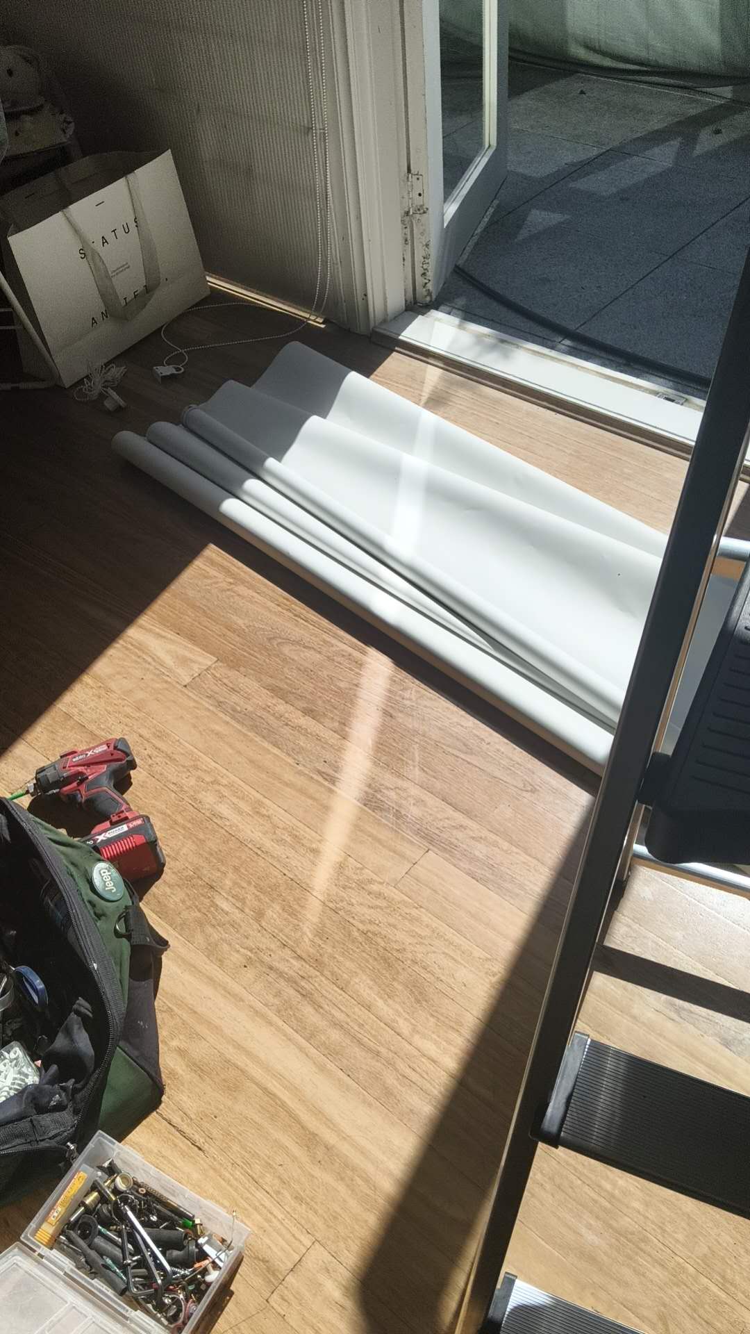 Door threshold and nearby work area with tools